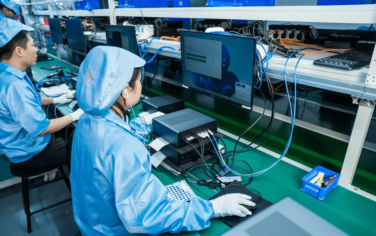 MINISFORUM technicians testing device ports and functions