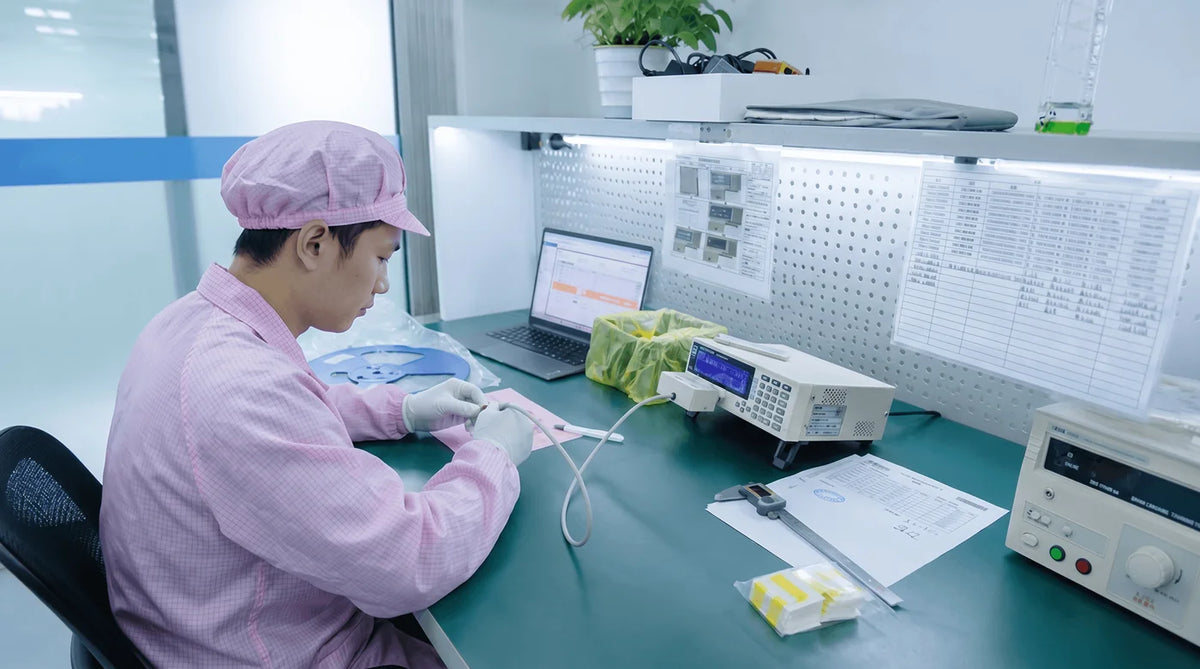 MINISFORUM technician inspecting incoming components